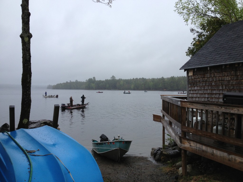 Fishing in Sebec Lake right in front of rental cottage